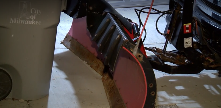 High pregnant woman goes for joyride on snow plow