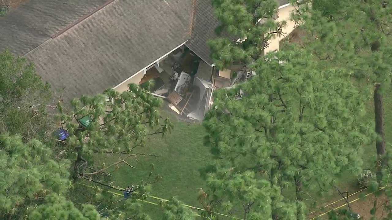 Sinkhole swallows portion of Florida home