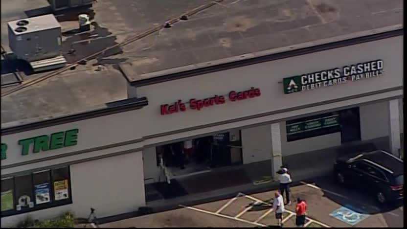 Car drives through front of business in Scott Township