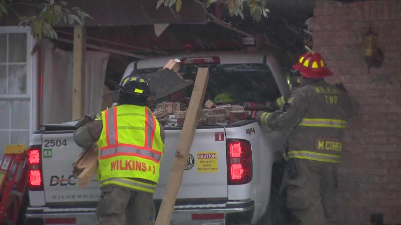 Duquesne Light truck crashes into home in Churchill