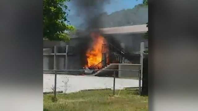 Man dies after intentionally driving car filled with propane tanks into ex's apartment