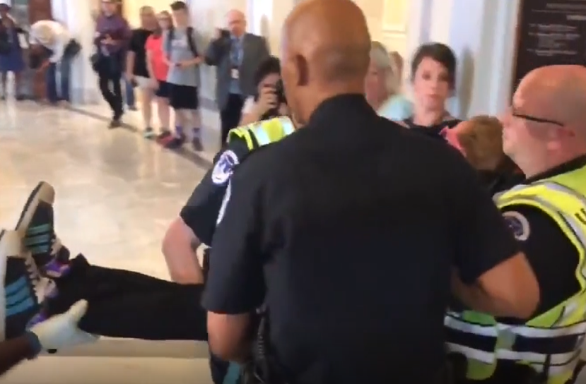 Dozens arrested after disability advocates protest at McConnell's office