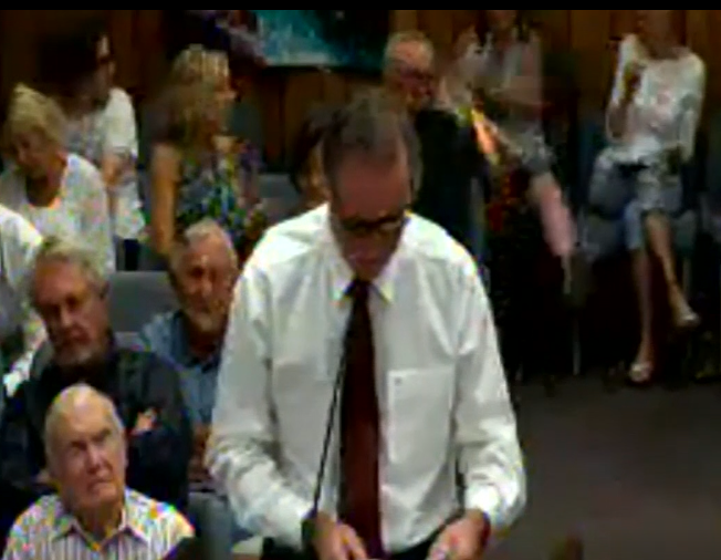 Woman injured after her purse burst into flames during meeting