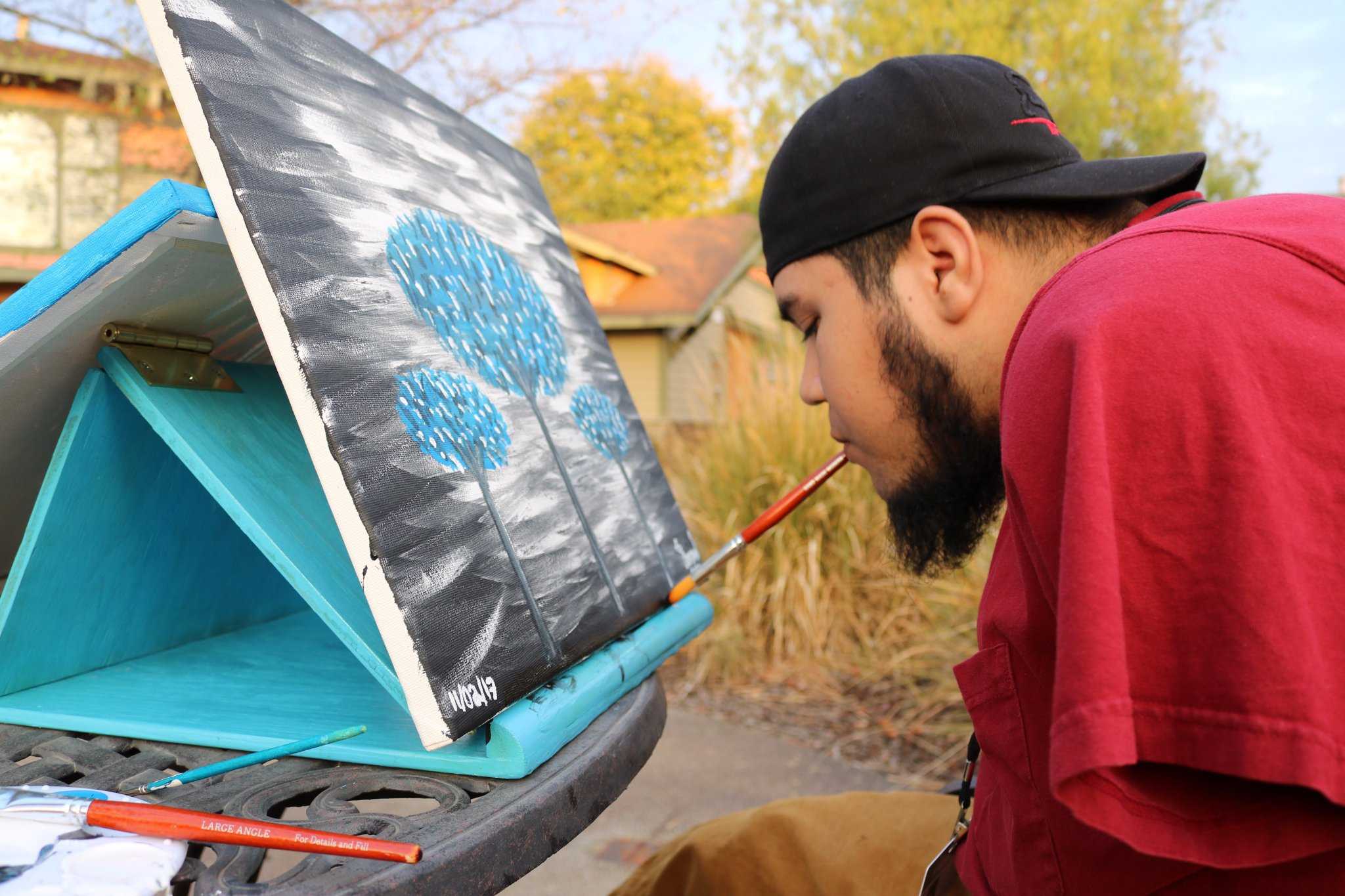 See this man create a painting using only his mouth
