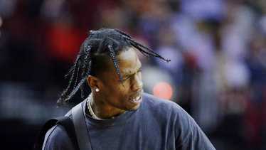 Rapper Travis Scott arrested after concert, officials say