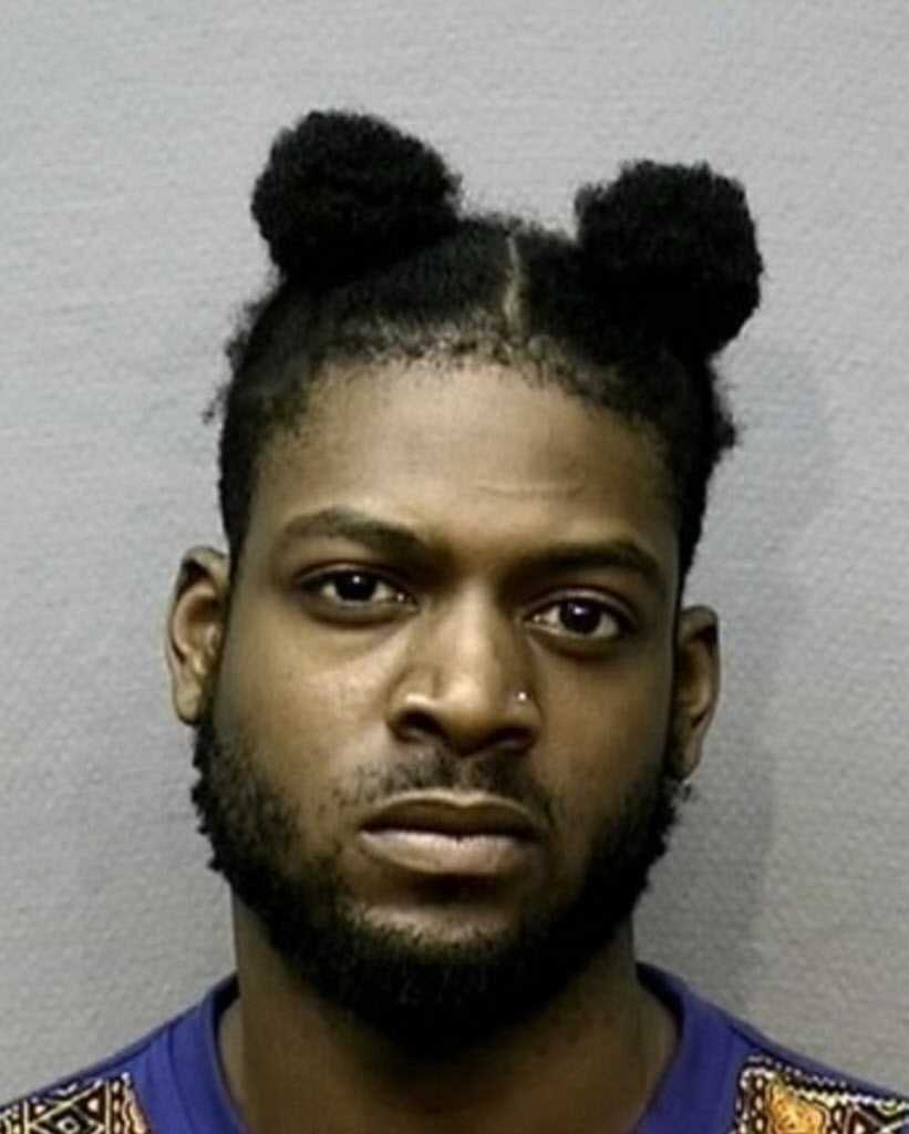 <p>This undated photo provided by the Houston Police Department shows Jared Balogun. On Tuesday, June 20, 2017, police announced that Balogun has been charged with capital murder in the fatal shooting of a 10-month-old boy who was killed while his father was walking him outside an apartment complex. (Houston Police Department via AP)</p>