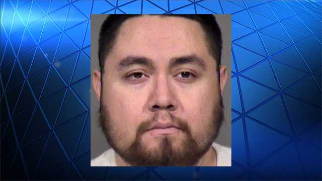 Police: Infant dies after Phoenix father bends him in two to stop crying