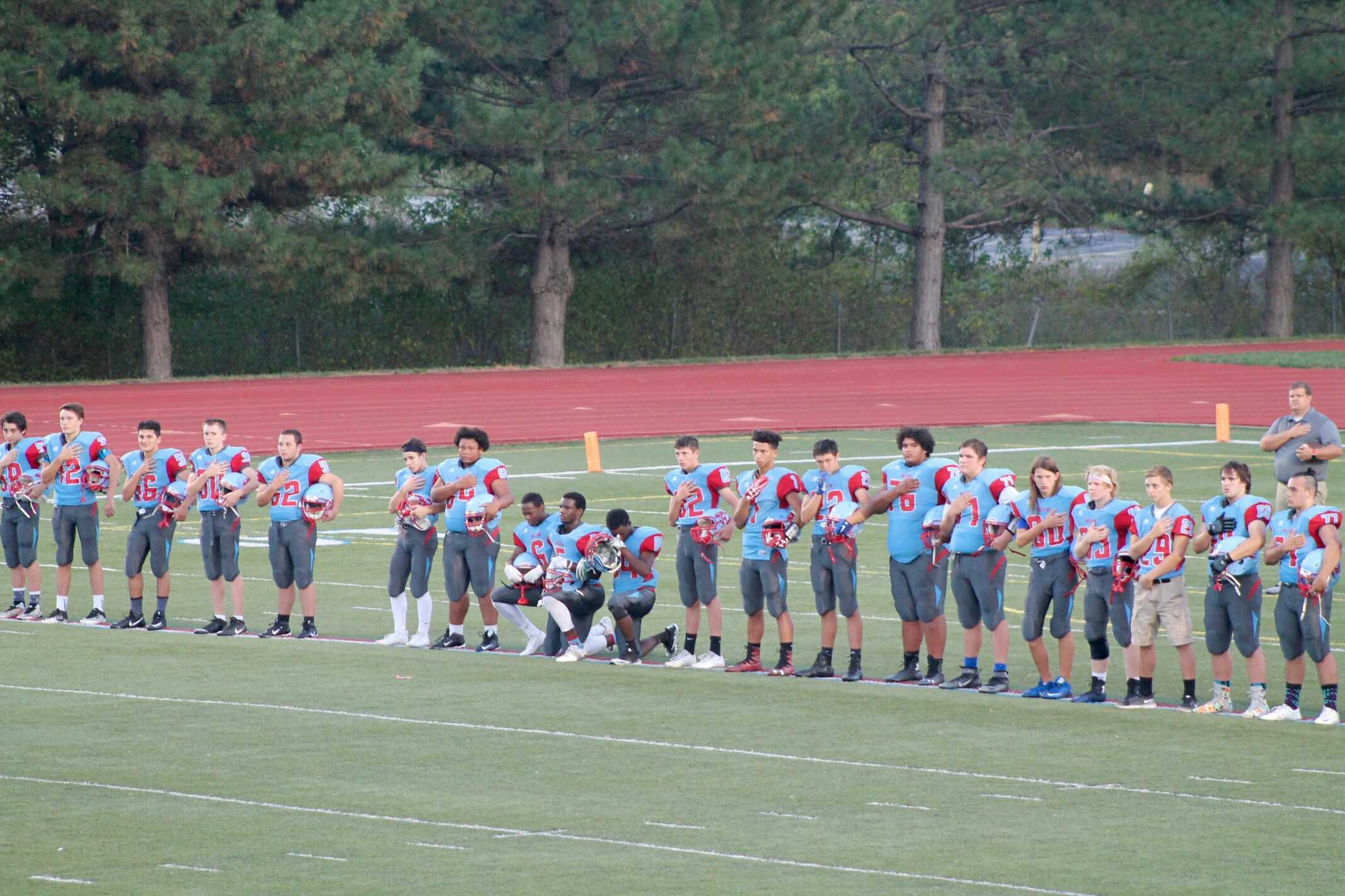 Ralston football player defends decision to kneel during national