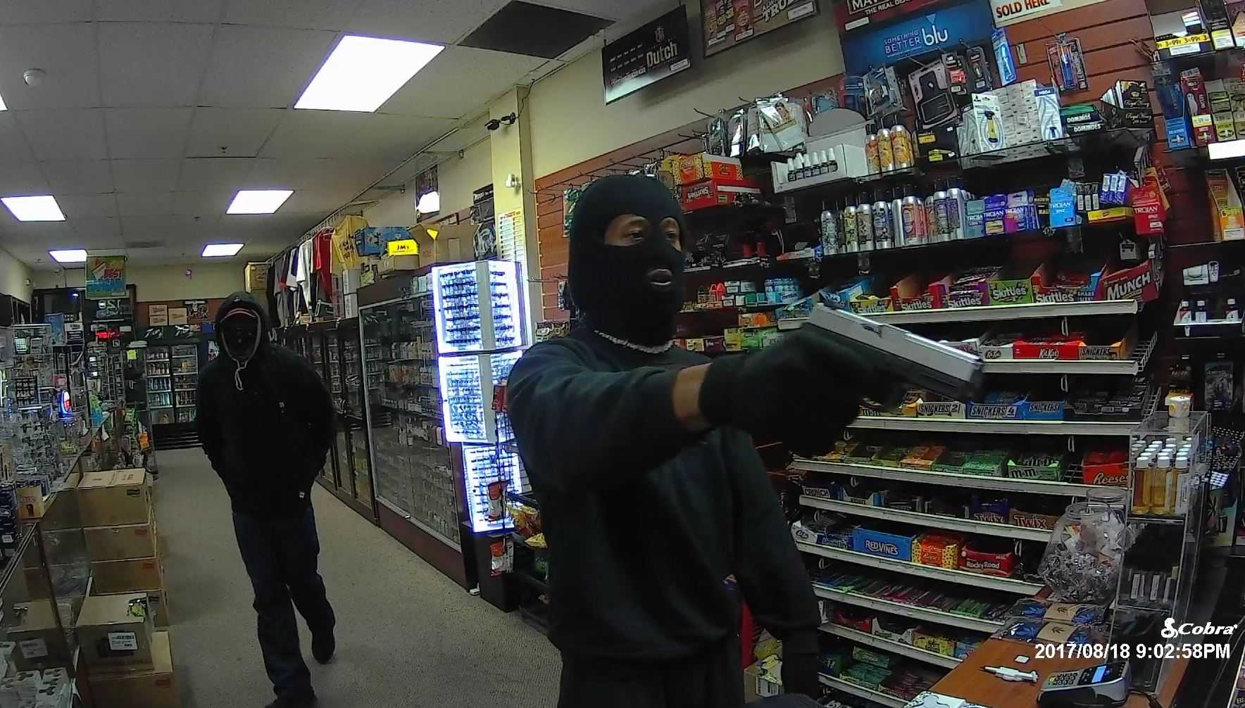 On camera: 3 men tie up, rob Natomas store clerk at gunpoint