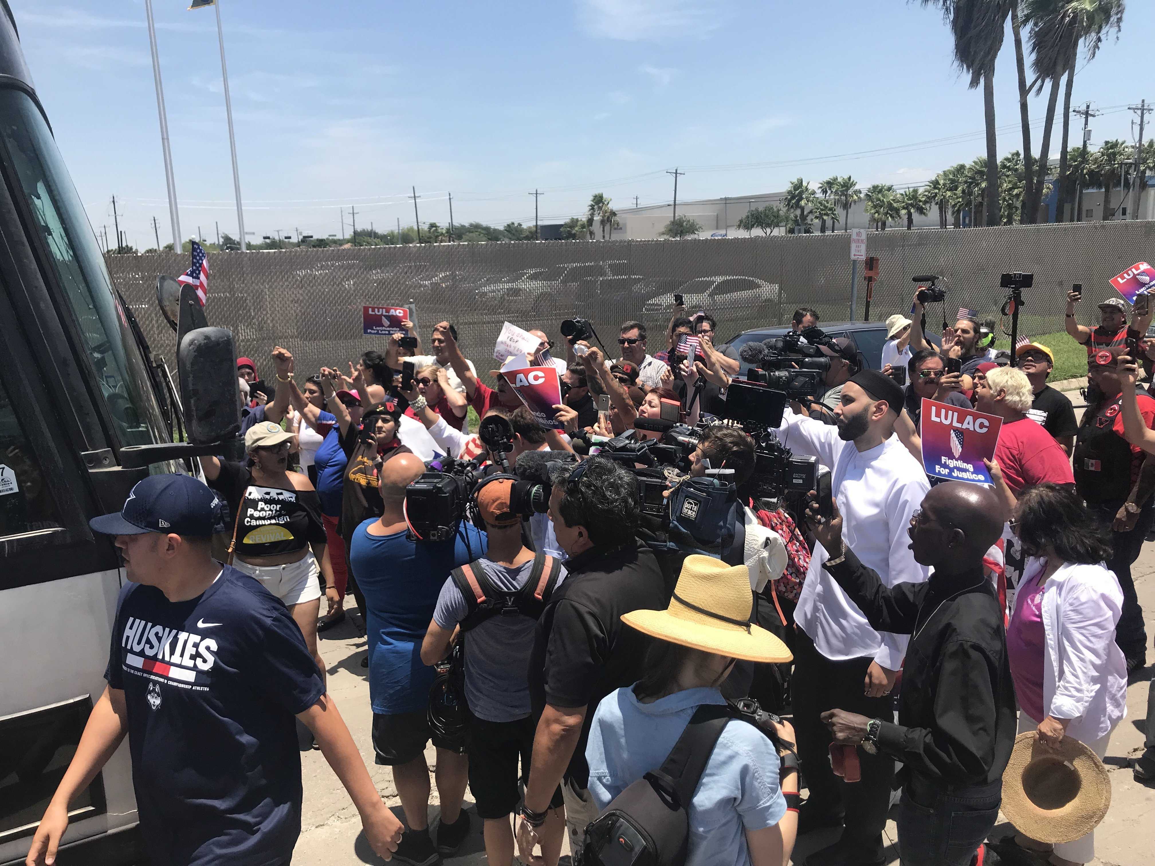Protesters briefly block bus leaving migrant detention center in Texas