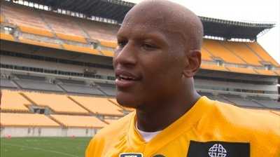 Ryan Shazier shown waving Terrible Towel, cheering on Steelers from private box during game vs. Patriots