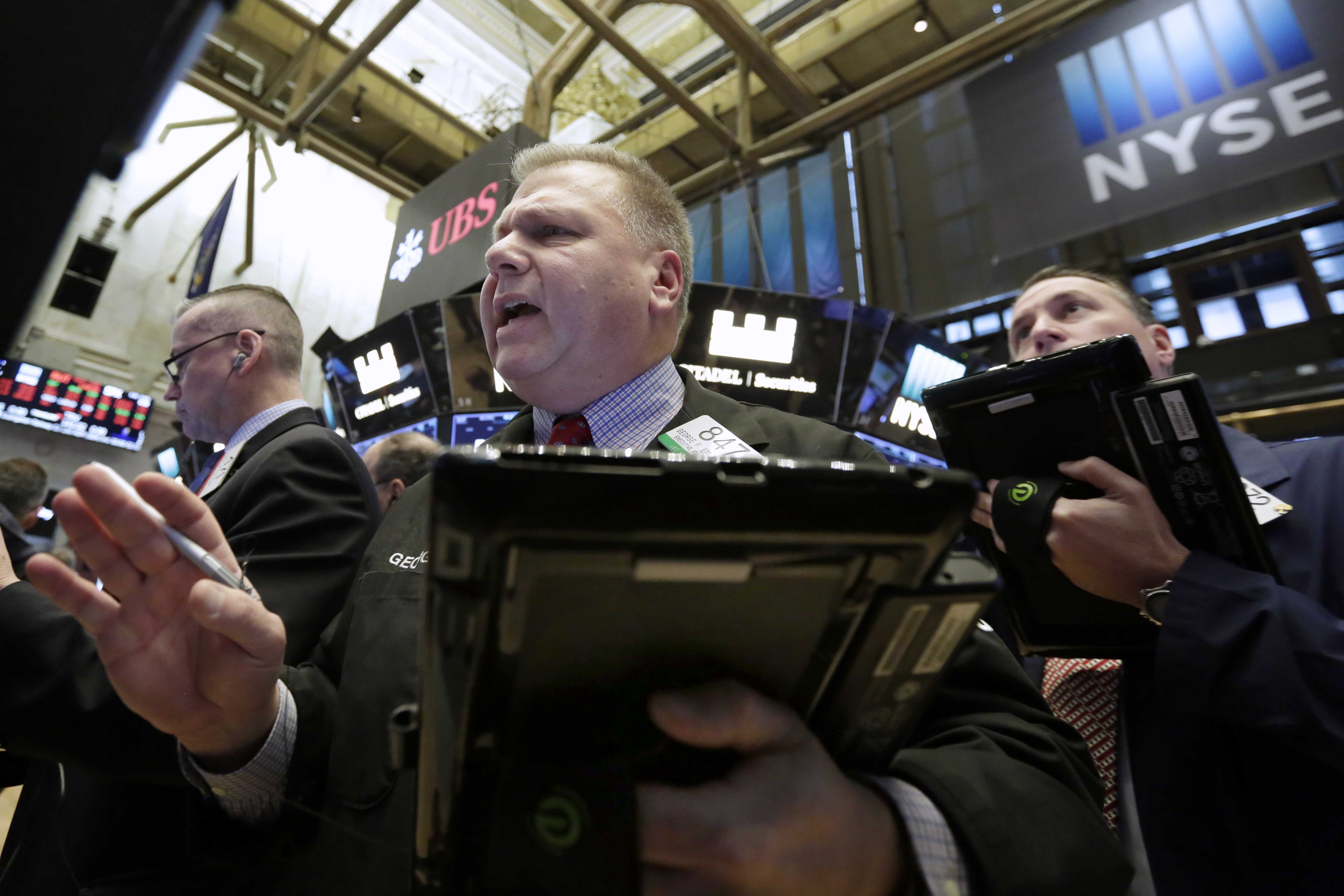 Stocks shake losses and finish strong in wild day of trading