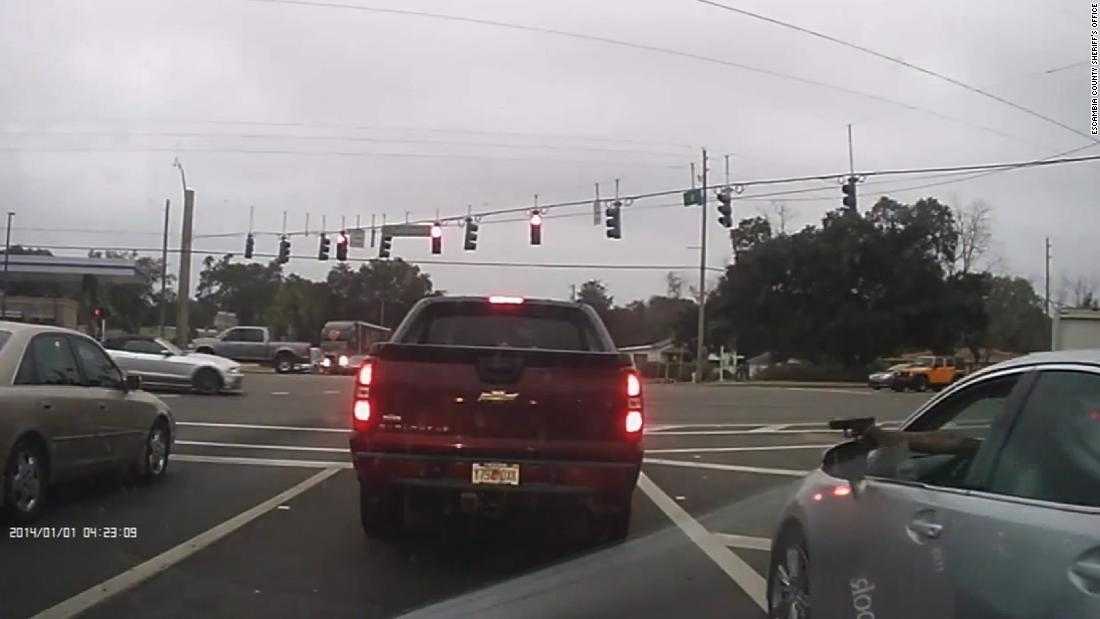 Caught on camera: Two suspects exchange gunfire at stoplight