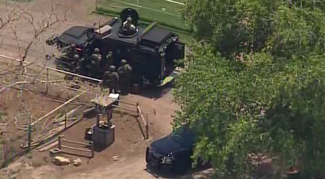 Man in custody after hours-long SWAT standoff