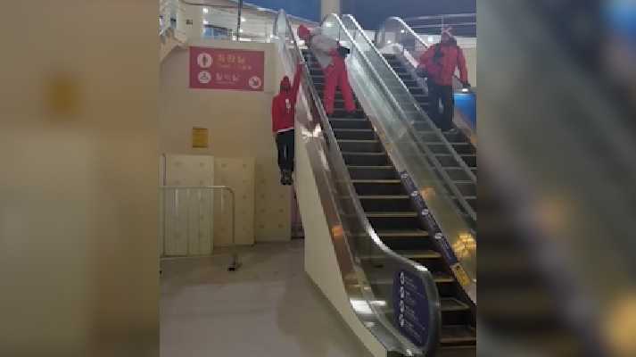 Swiss freestyle skier Fabian Bösch discovers interesting way to use escalator