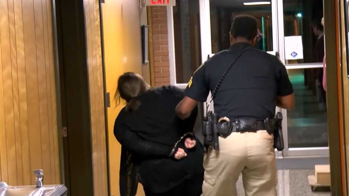 'Out of order' Louisiana teacher dragged from school board meeting in handcuffs