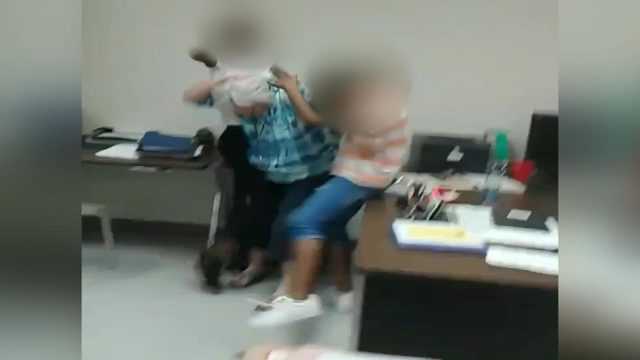 Video Middle School Teacher Repeatedly Slapped During Fight Between