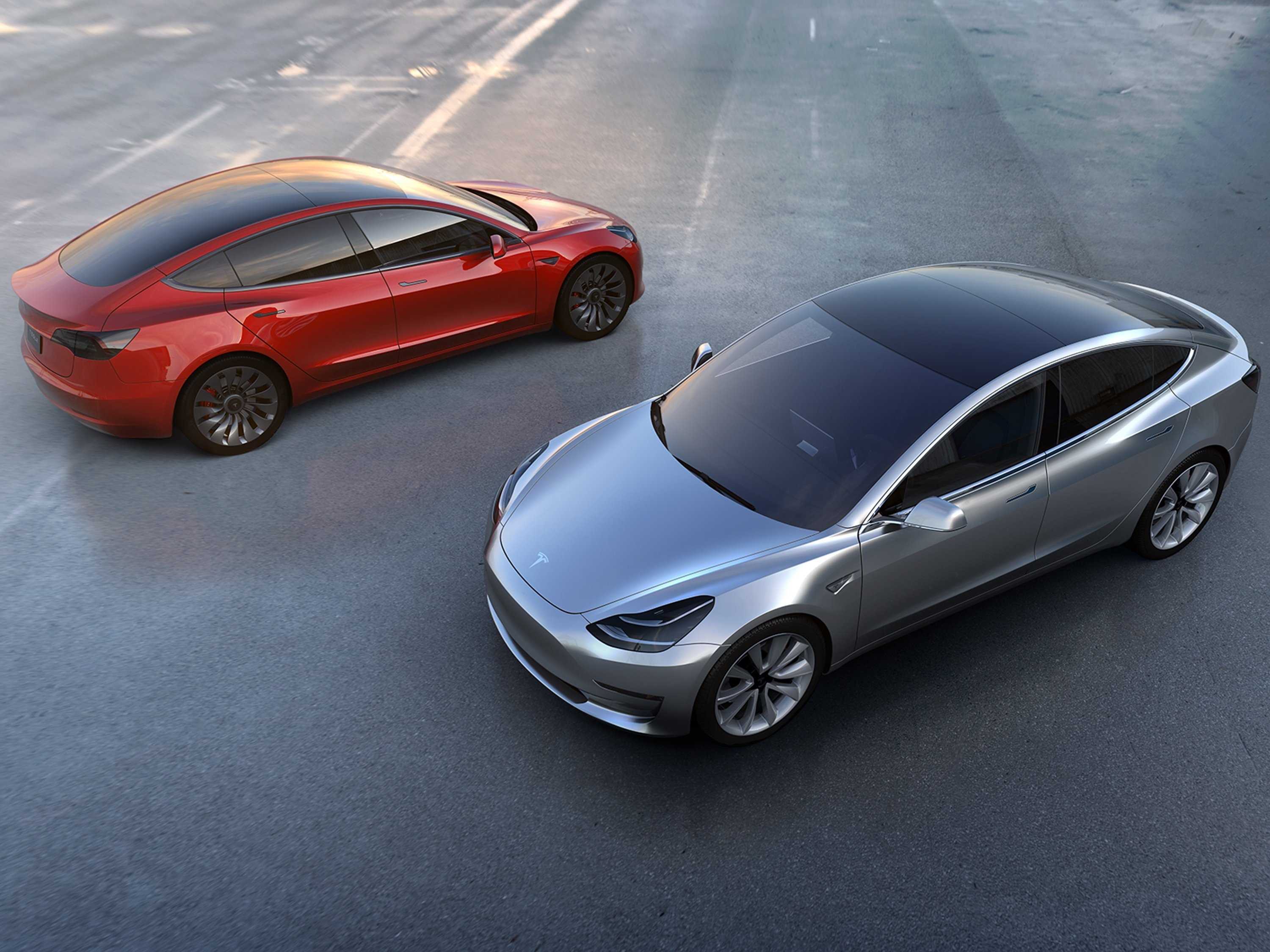 Tesla delivers first 30 Model 3s in historic moment