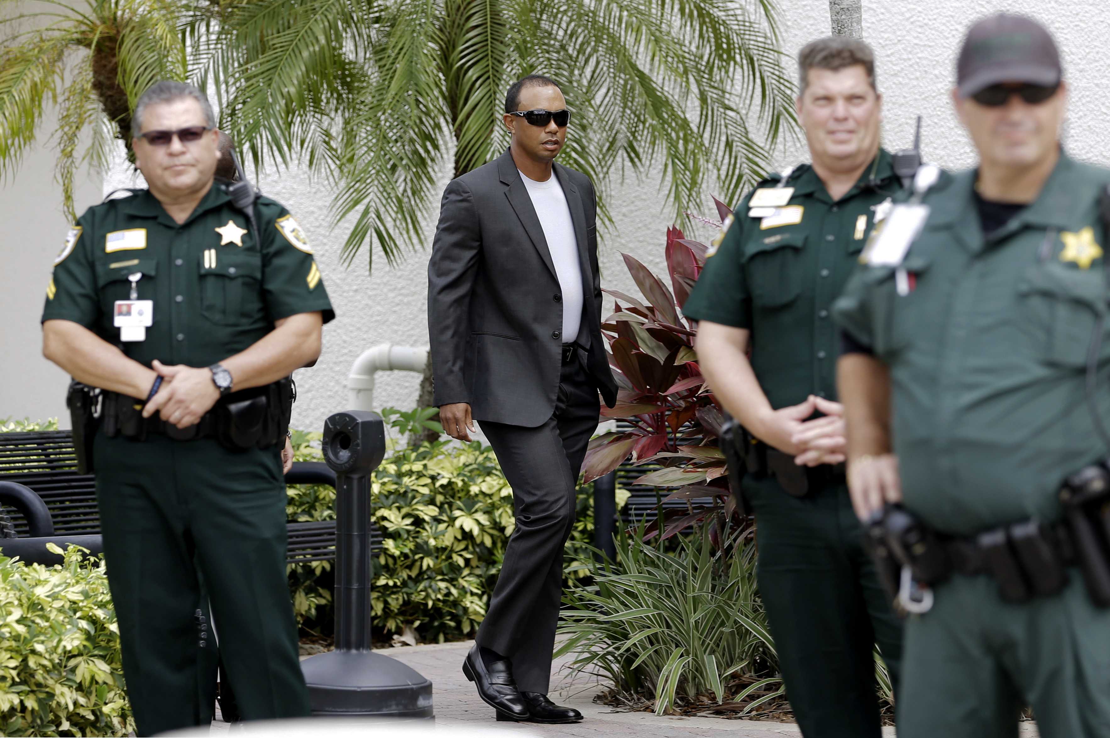 Tiger Woods pleads guilty to reckless driving to avoid DUI conviction