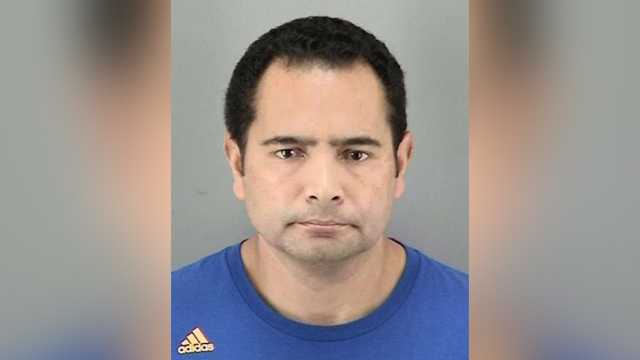 Police: Teacher dangled elementary school student from second-floor balcony