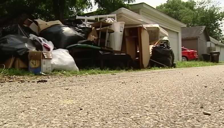 Child covered in feces walks into stranger's home, found eating from trash