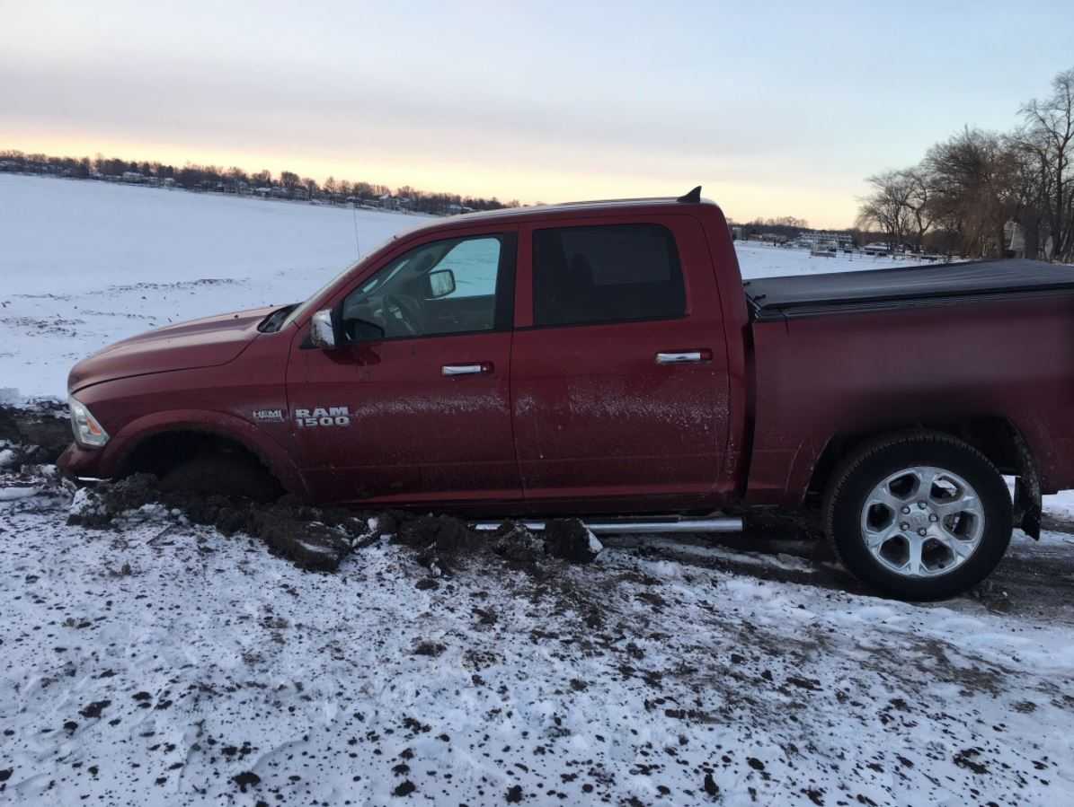 WATCH: Pickup truck gets stuck in frozen lake