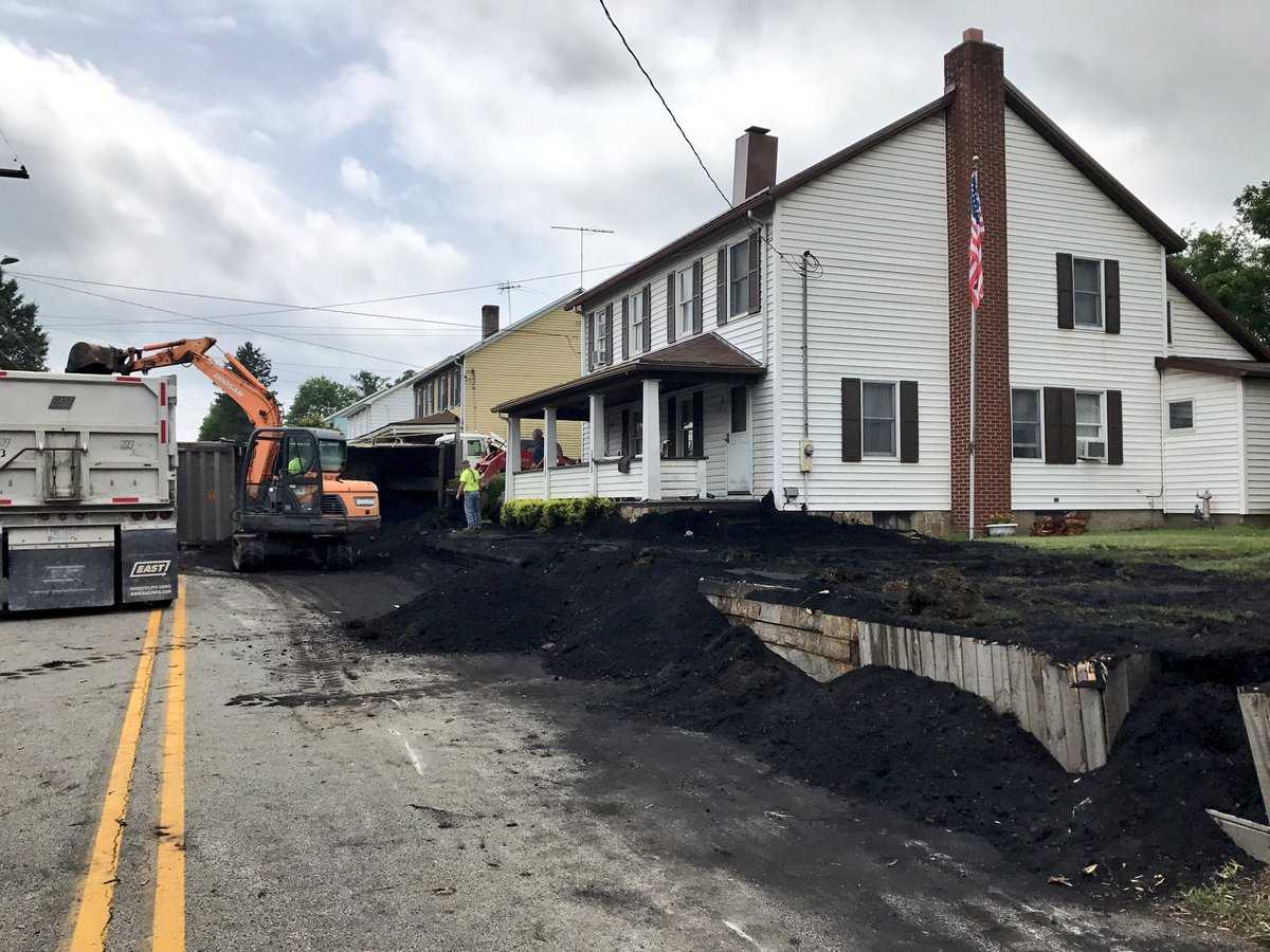 Truck flips on Route 119 and spills 25 tons of coal