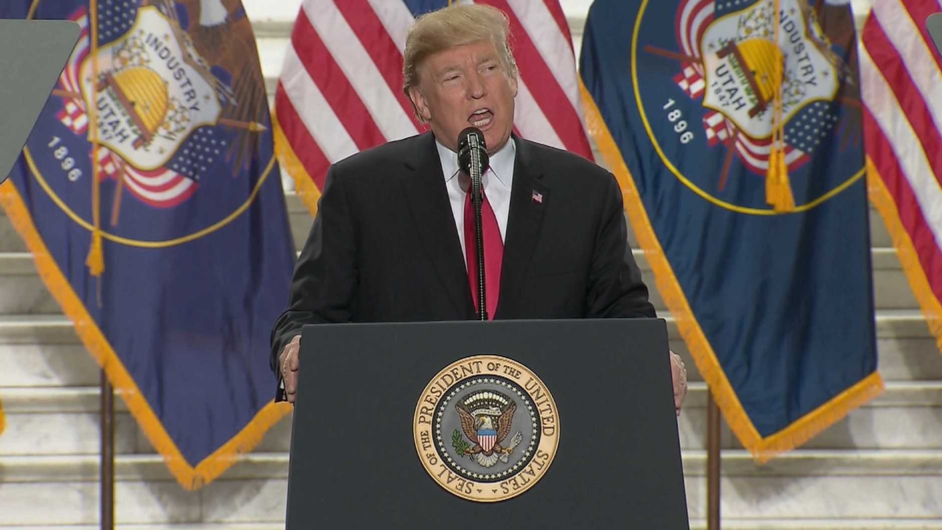 Trump signs 2-week spending bill to avoid government shutdown