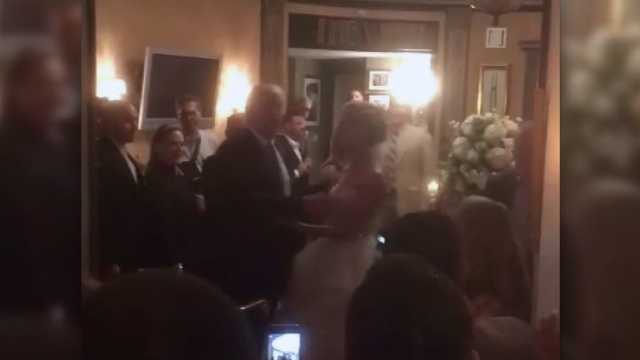 Trump makes surprise appearance at wedding reception