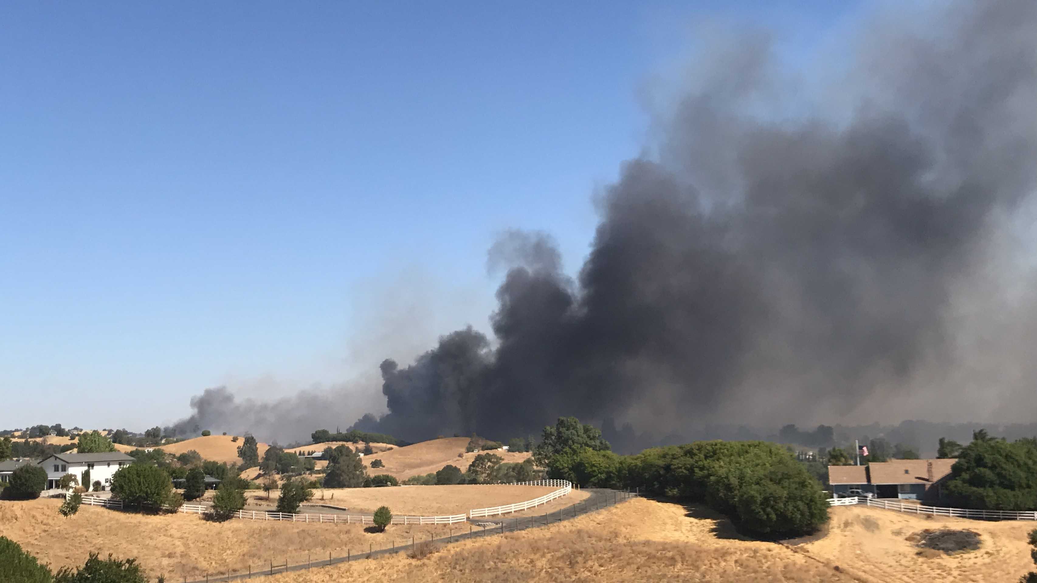 Homes evacuated as crews battle 4-alarm vegetation fire in Vacaville