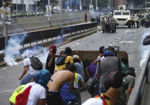 Venezuelans shut down capital roads to protest government