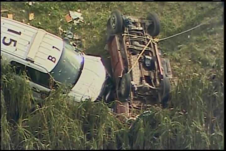 Interstate 70 chase ends with police car, 2nd vehicle crashed on side of highway