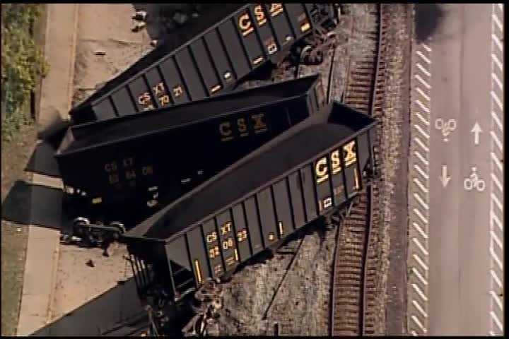 Train derailment sends cars off tracks, spilling coal in McKeesport
