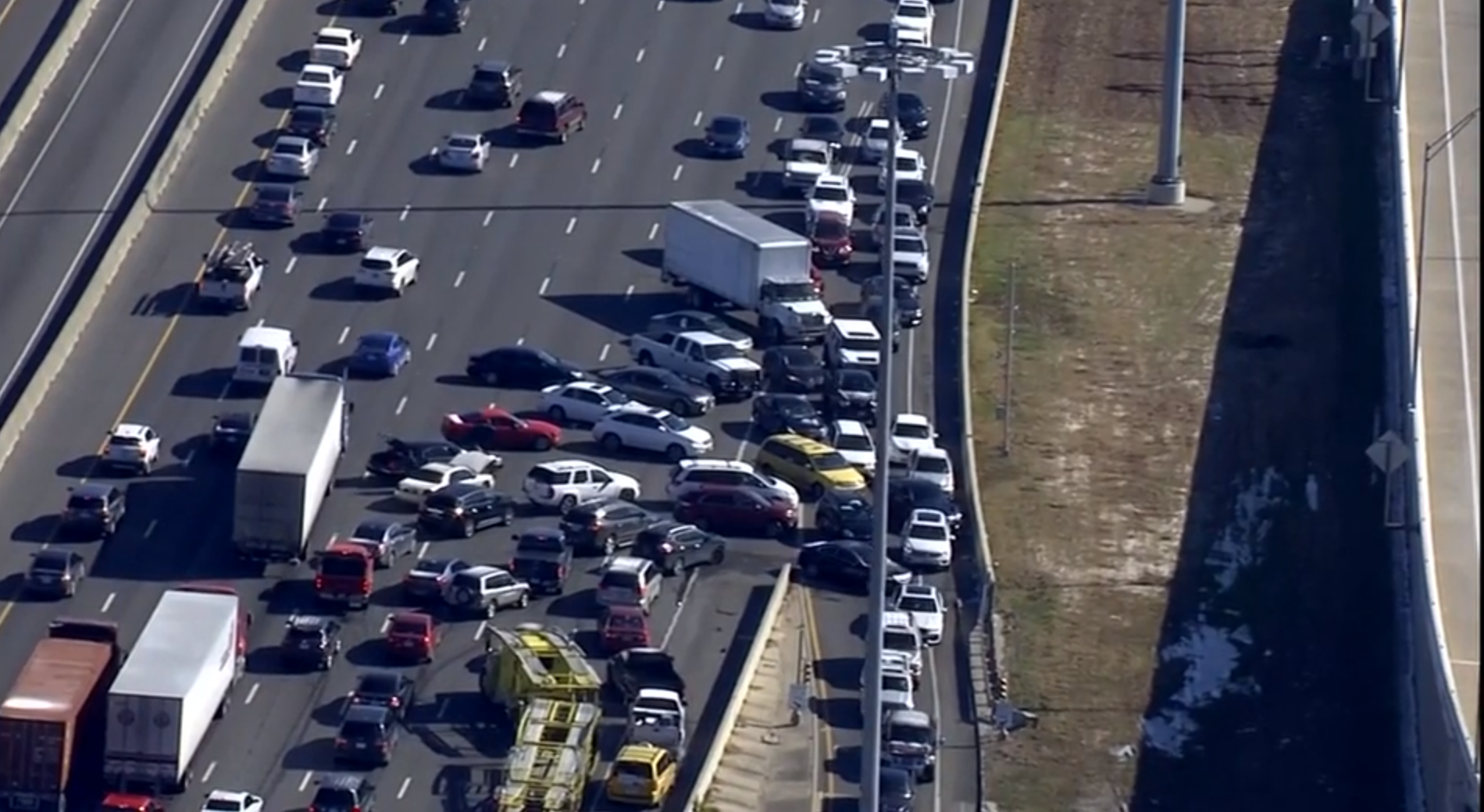 Watch: Texas drivers go wrong way on freeway to avoid ice