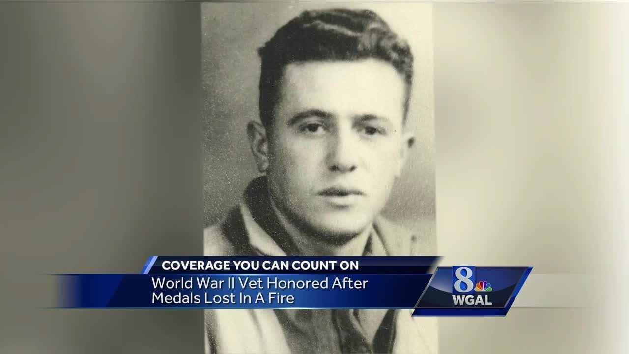 WWII vet, 97, honored after medals lost in fire