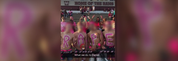 Four students face punishment after photo shows them spelling "Rape" at football game