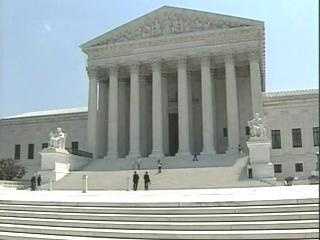 Justices allow strict enforcement of Trump refugee ban