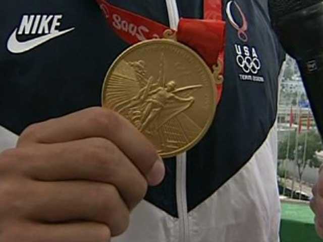 Girl finds stolen Olympic medal in trash