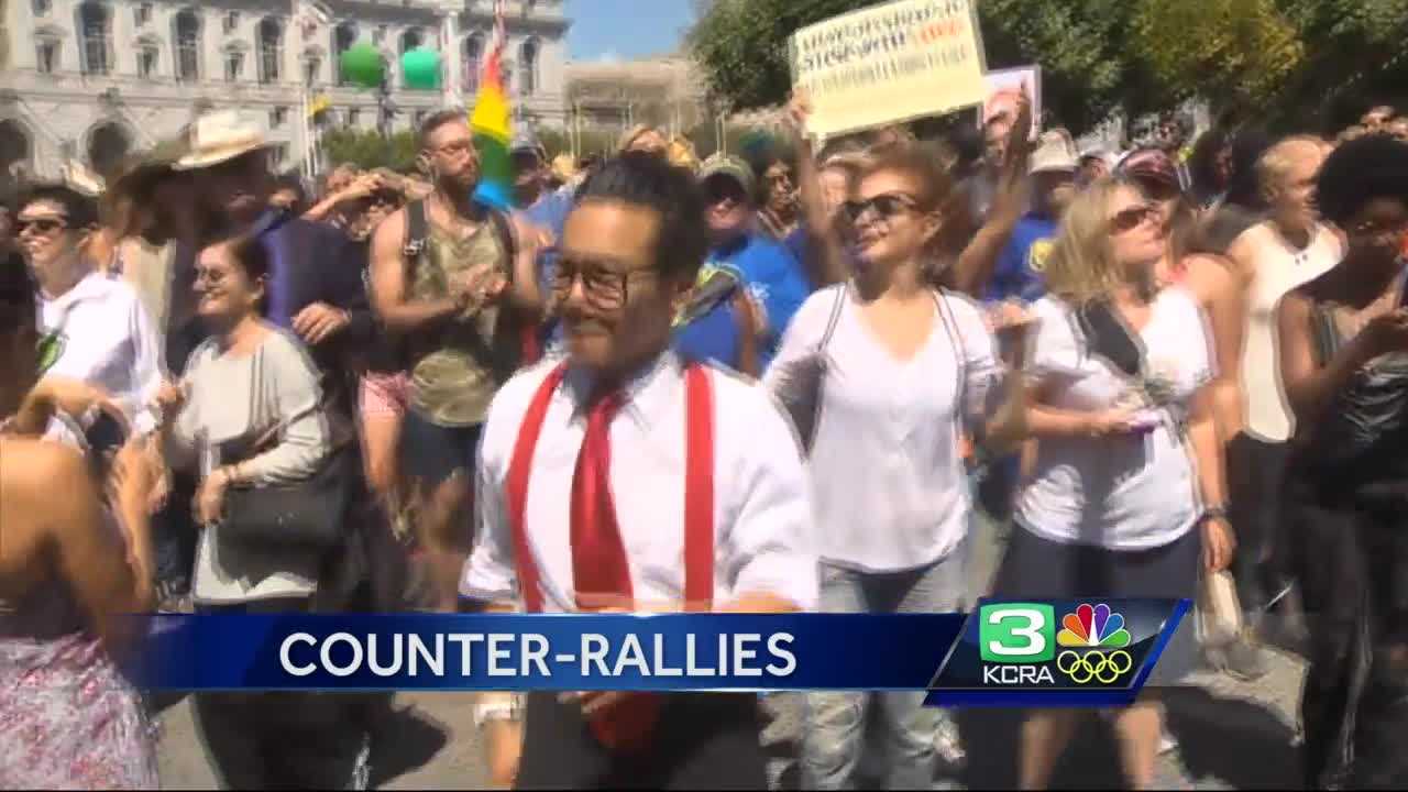 Hundreds gather for unity near counter protests