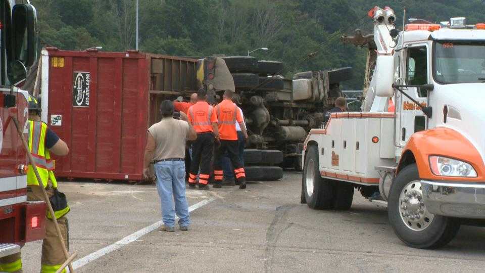 Tri-axle truck tips over, blocking Route 51 near Liberty Tunnel