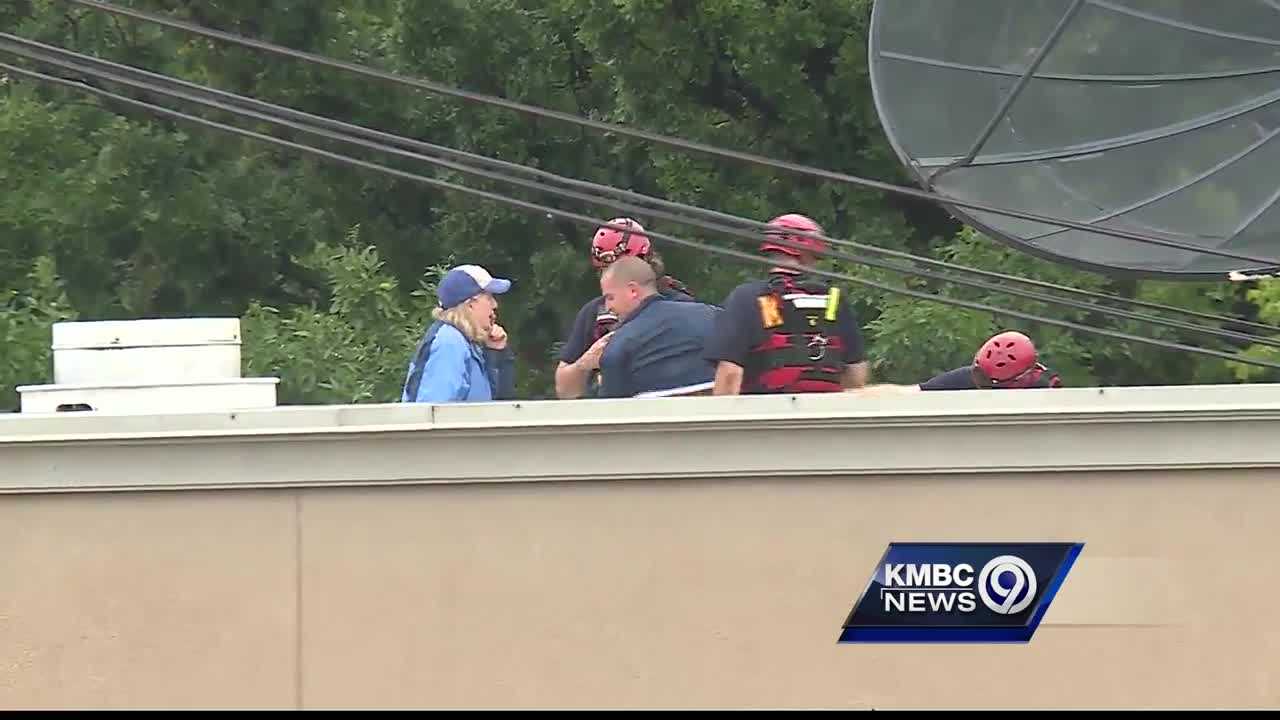 Fire crews rescue 2 people trapped by flooding at KC bar