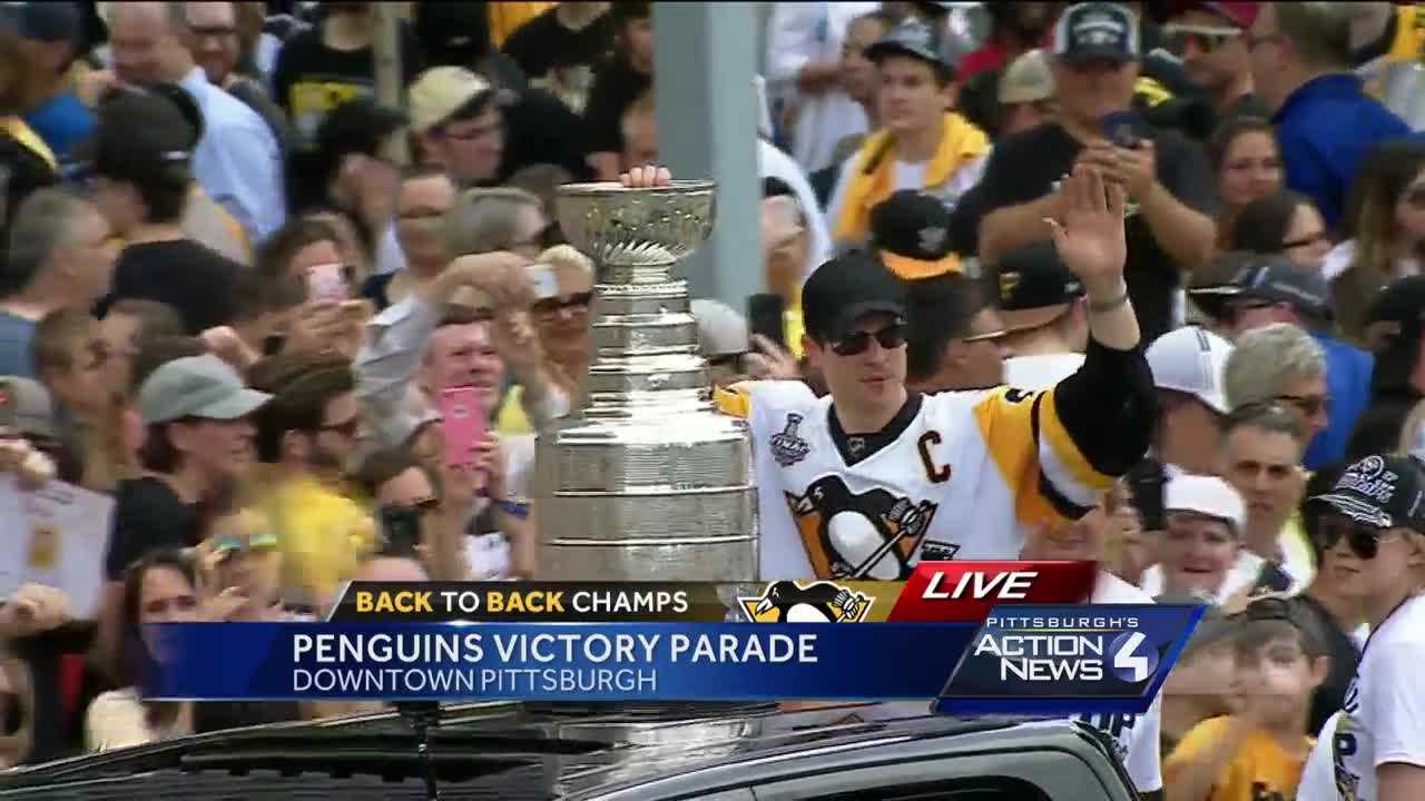 Sidney Crosby rides through parade with Stanley Cup