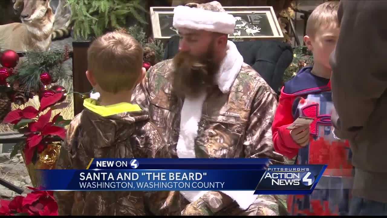 Brett Keisel greets fans at Field and Stream dressed in camouflage santa suit
