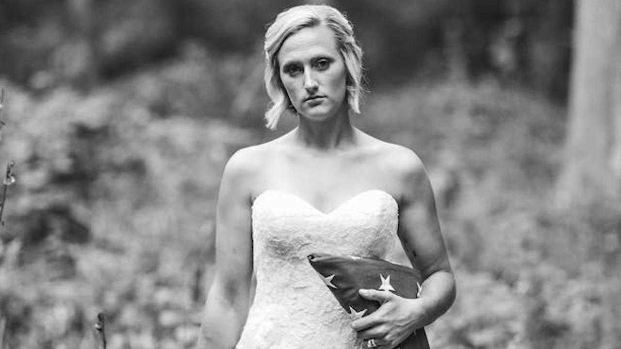 Woman takes wedding photos alone after police officer fiancé is killed on duty