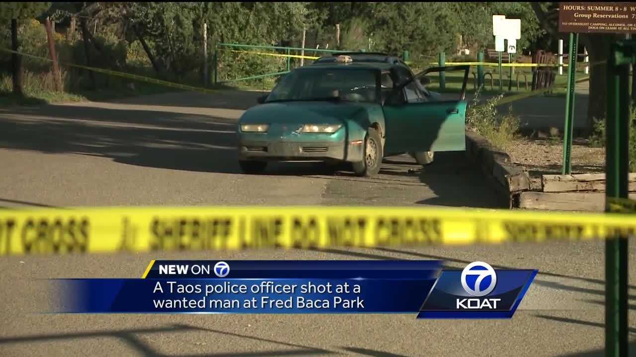 Police officer misses suspect, shoots passenger