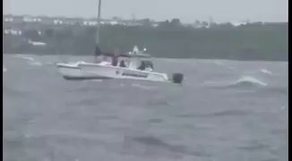 WATCH: Authorities try to rescue people who stayed on boat during Irma