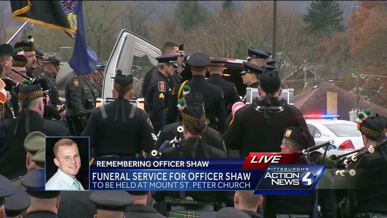 VIDEO: Police pallbearers carry New Kensington Officer Brian Shaw's casket into church