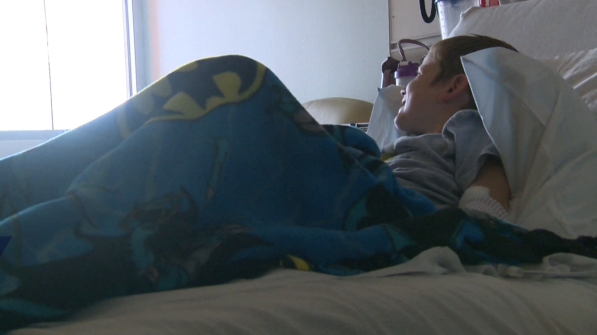 Window washers dress as superheroes to cheer up sick kids