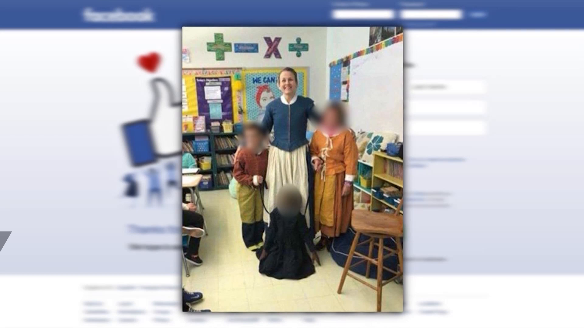 School apologizes for photo showing kids holding girl with 'leashes'