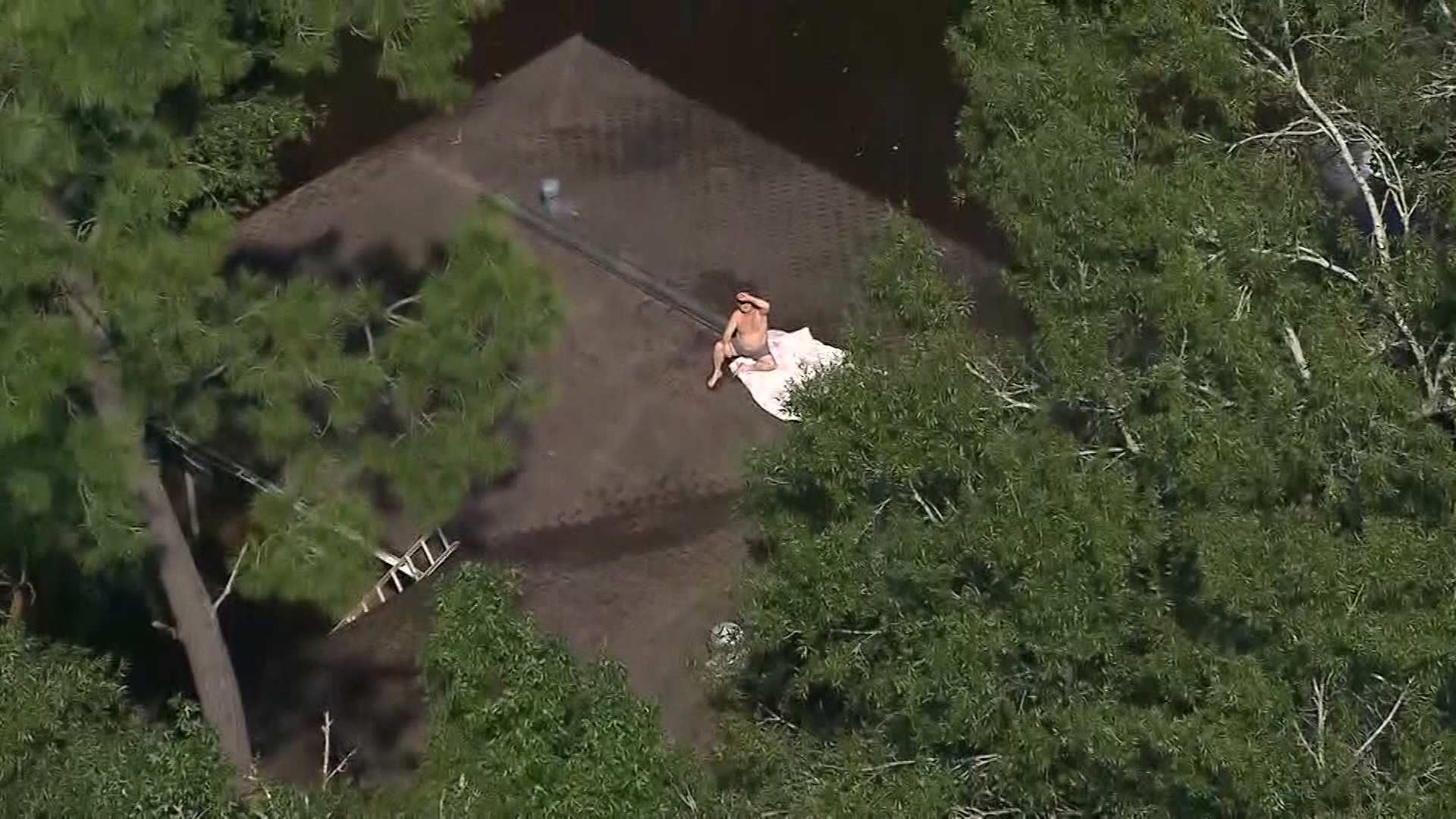 Jaw-dropping video shows rescue of people stuck on roof due to Harvey floodwater
